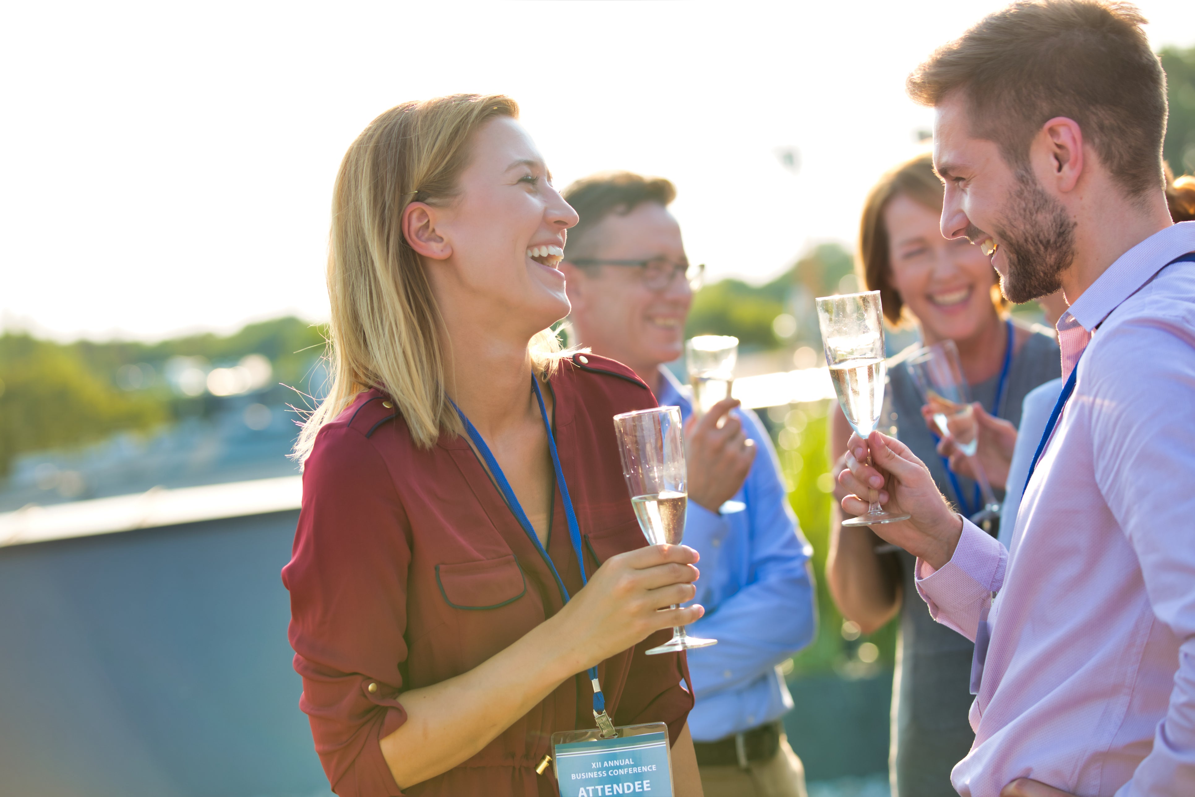 Group of people enjoying drinks outdoors